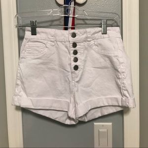 White shorts w/ buttons going up middle